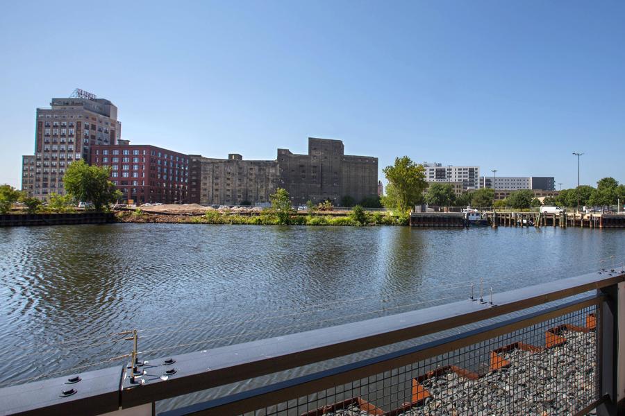 A river runs through an industrial area.